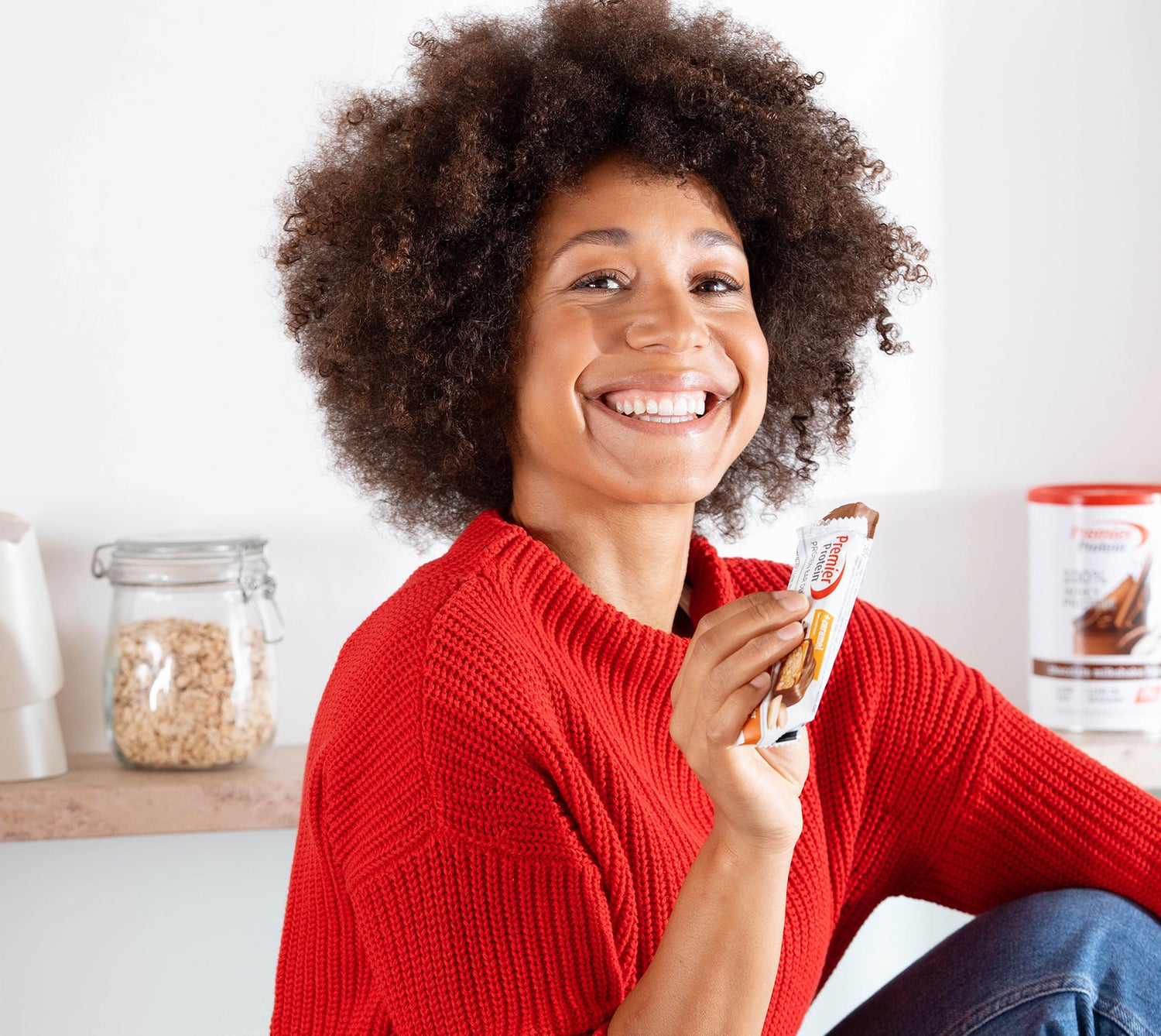 Woman with Premier Protein Bar